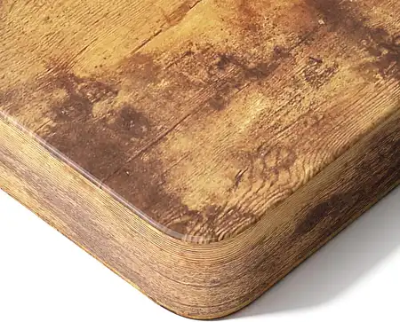 Primer plano del tablero de madera maidesite estilo vintage para marco escritorio elevable, con acabado rústico y esquinas redondeadas para un setup con personalidad.